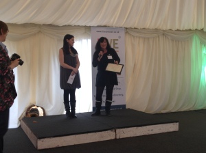 Bridget Rendall collecting the Platinum Award in Vegetables for Shillingford Organics